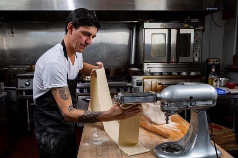 Diego Funes making fresh dough for empanadas.